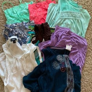 Lot of 8 sleeveless xl shirts.